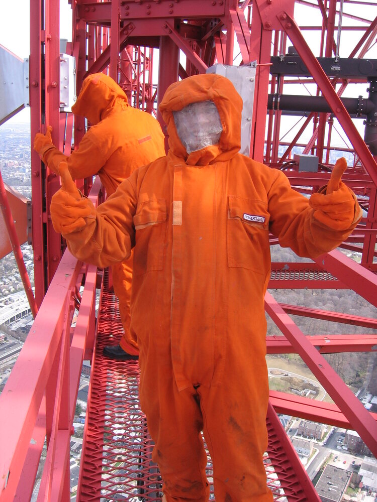Microwave antenna installation on a tower
